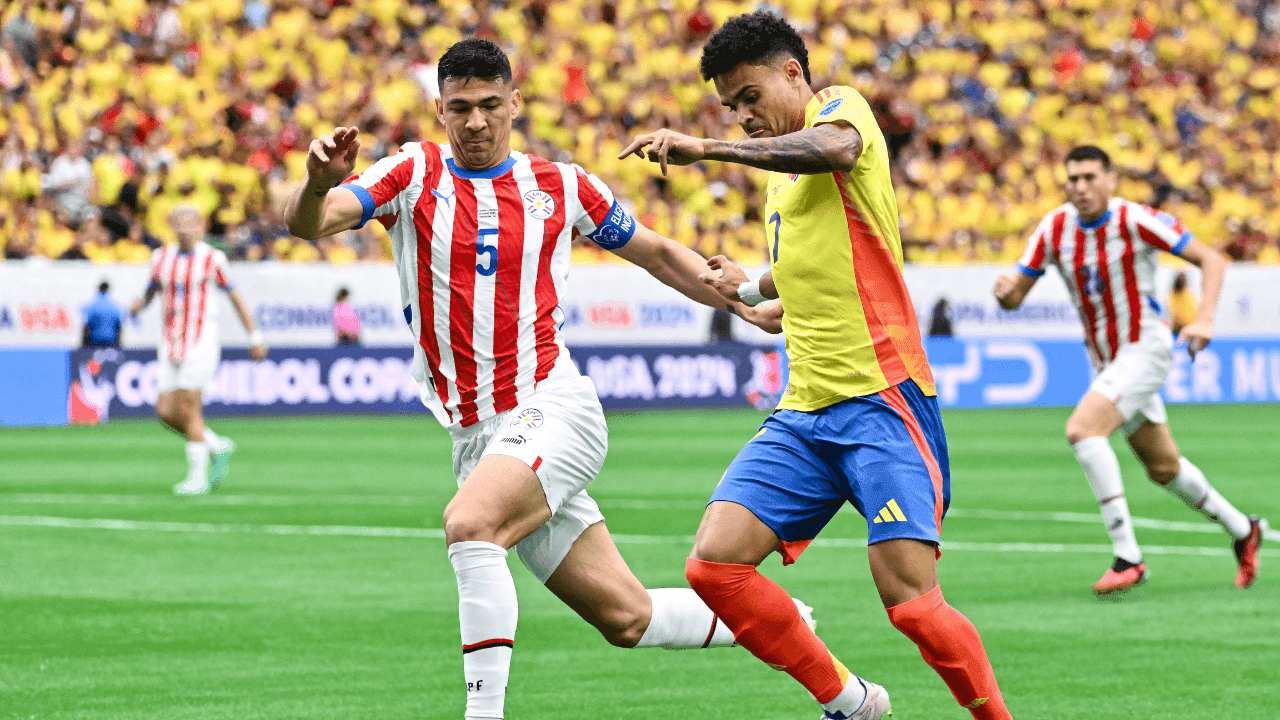 photologuephotos2025-06luis_diaz_regatea_ante_un_defensor_paraguayo_en_la_copa_america_2024png photologuephotos2025-06luis_diaz_regatea_ante_un_defensor_paraguayo_en_la_copa_america_2024png