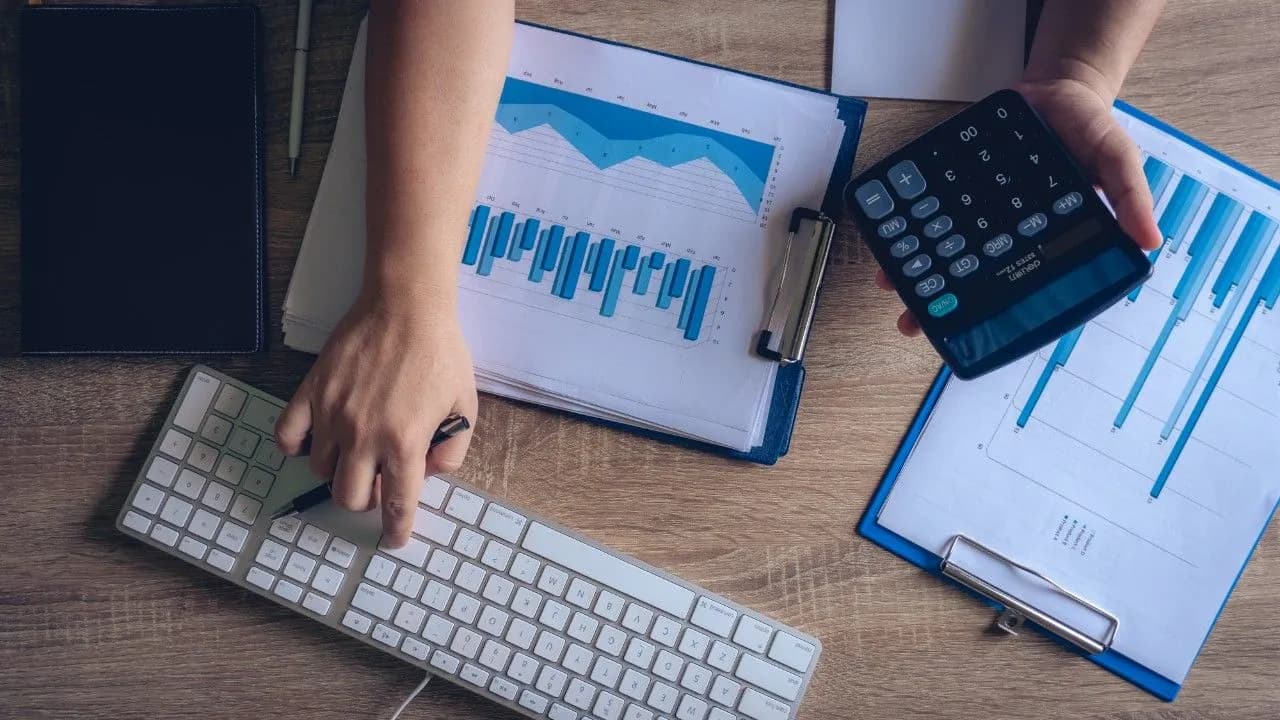 photologuephotos2024-05modern-office-working-desk-table-business-hands-uses-calculator_1jpg photologuephotos2024-05modern-office-working-desk-table-business-hands-uses-calculator_1jpg