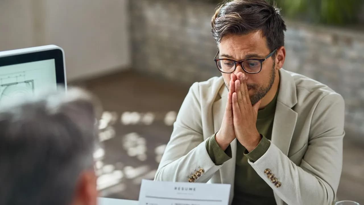 photologuephotos2022-10distraught-young-man-feeling-uncertain-while-having-job-interview-in-the-office_1jpg photologuephotos2022-10distraught-young-man-feeling-uncertain-while-having-job-interview-in-the-office_1jpg